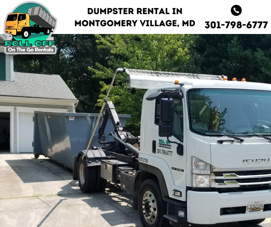 A roll-off dumpster truck providing service in a residential area for Roll Off On the Go Rentals in Silver Spring, MD.