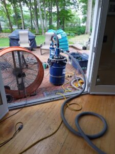 Dust collection system and fan used during wood floor sanding by Robert C. Mihaich Wood Flooring in Worcester, MA.