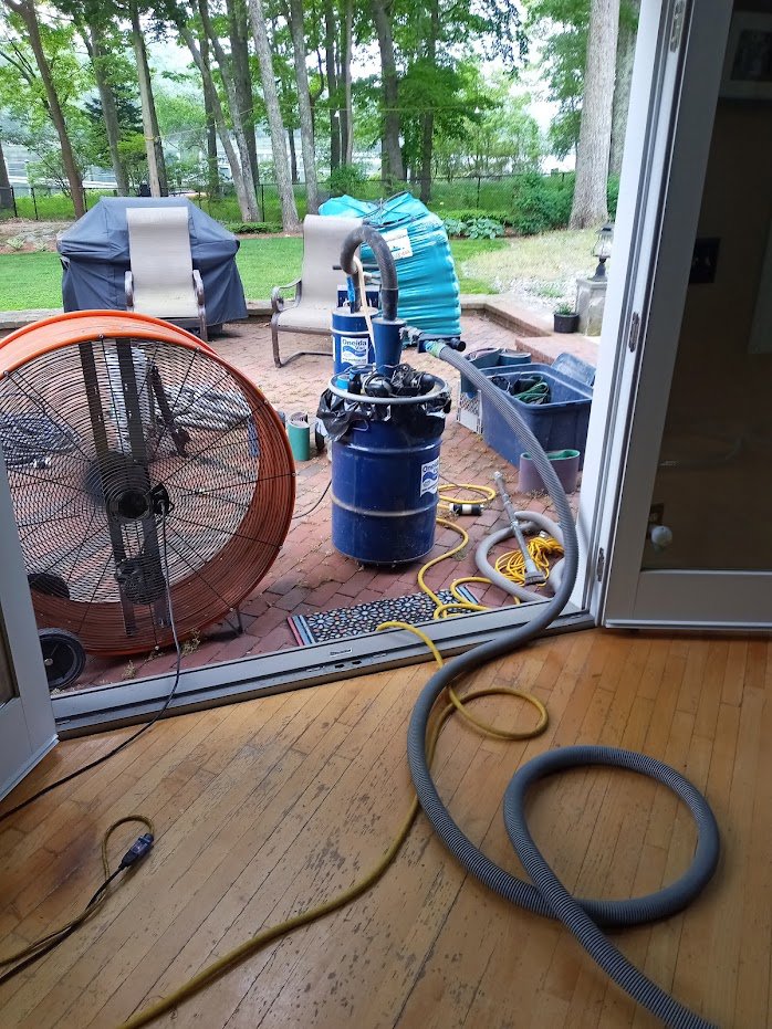 Dust collection system and fan used during wood floor sanding by Robert C. Mihaich Wood Flooring in Worcester, MA.