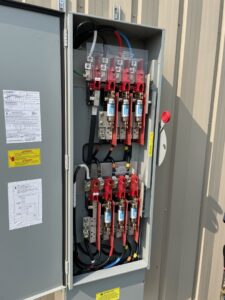 An open electrical panel showing wiring and fuses, installed by Specialty Service Group in Knoxville, TN.