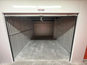 A completely empty and clean storage unit after professional junk removal by Junk Pros NW in Bellevue, WA.