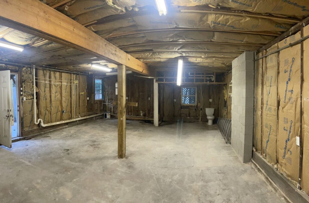 An empty garage space after a thorough cleanout service by JDog Junk Removal & Hauling Savannah/HHI.