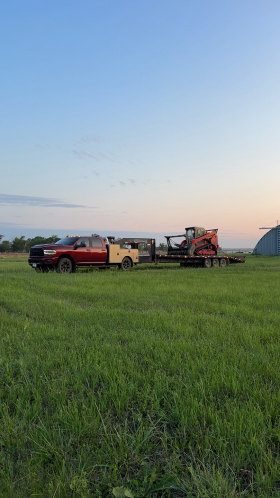 Equipment transport for land clearing services by Dakota Timber Clearing LLC in Wagner, SD