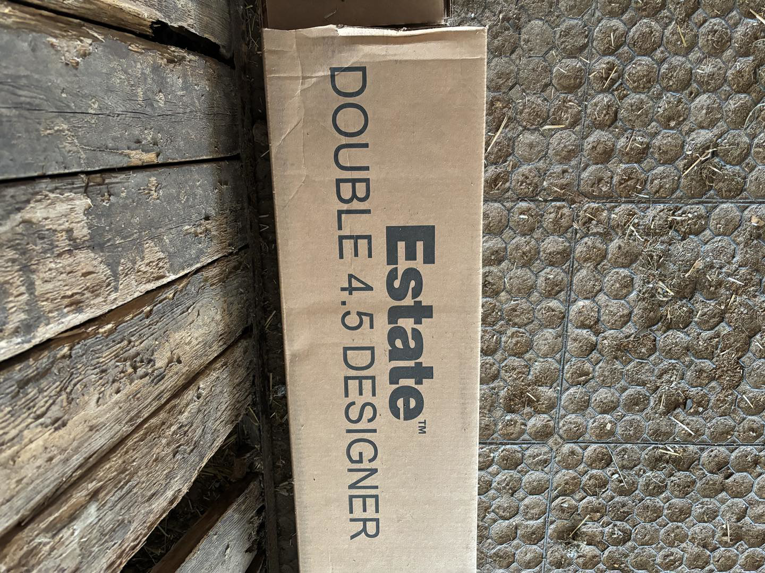 A box of Estate Double 4.5 Designer siding materials for E.L.Y Siding Company in Buckner, MO
