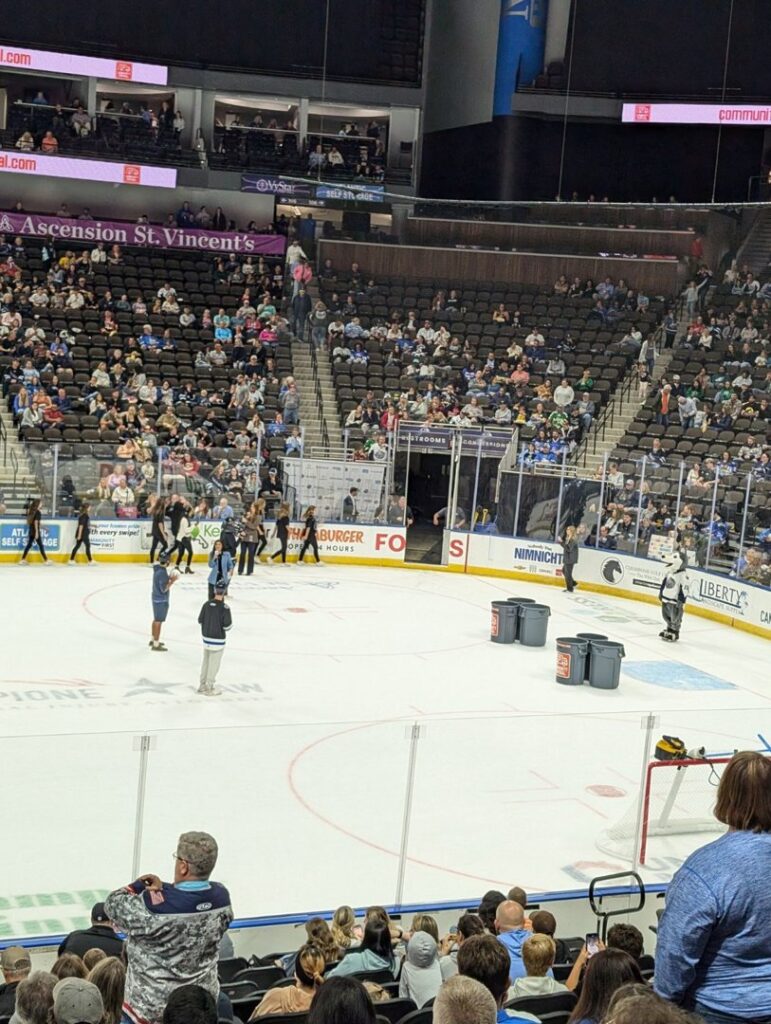 Community Disposal waste bins on an ice rink during an event, providing disposal services in Jacksonville, FL.