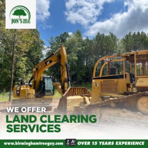 An excavator and a bulldozer on a cleared site, demonstrating land clearing services by Jon's Tree Service in Pelham, AL.