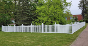 An extensive white picket fence installation showcasing craftsmanship by Cyclone Fence in Somerset, WI.