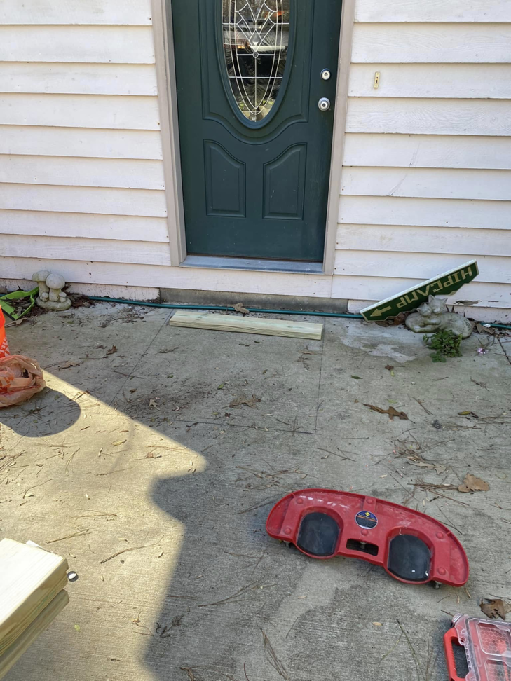 An exterior door area with materials ready for a repair or installation project by Atlanta Handyman and Repair LLC in Johns Creek, GA.