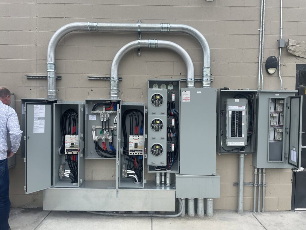 Exterior electrical meters and panels installed on a commercial building by Specialty Service Group in Knoxville, TN.