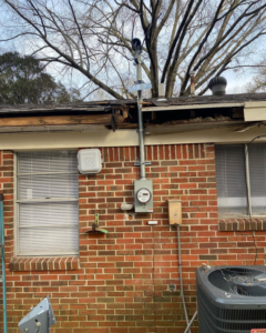 An exterior electrical service meter and wiring repair on a house by Gingy's Electrical Services, LLC in Memphis, TN.