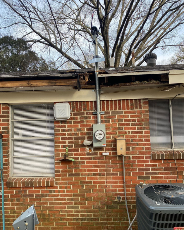An exterior electrical service meter and wiring repair on a house by Gingy's Electrical Services, LLC in Memphis, TN.