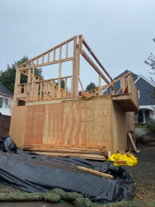 Exterior wood framing and plywood sheathing for a new structure by Mode Contracting in Seattle, WA.