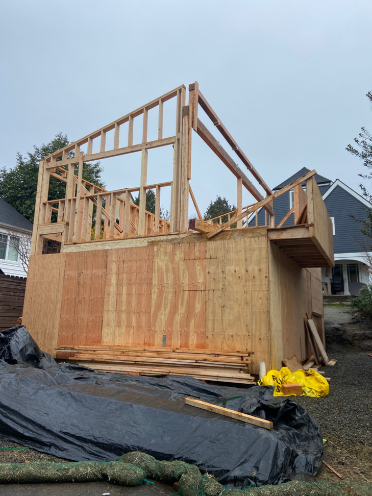 Exterior wood framing and plywood sheathing for a new structure by Mode Contracting in Seattle, WA.