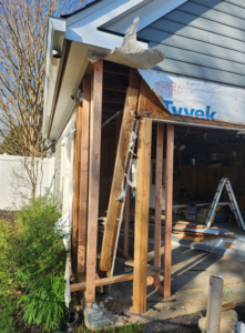 Exterior home renovation with exposed framing and Tyvek wrap by 4A Contracting and Home Improvement Specialists in Frederick, MD