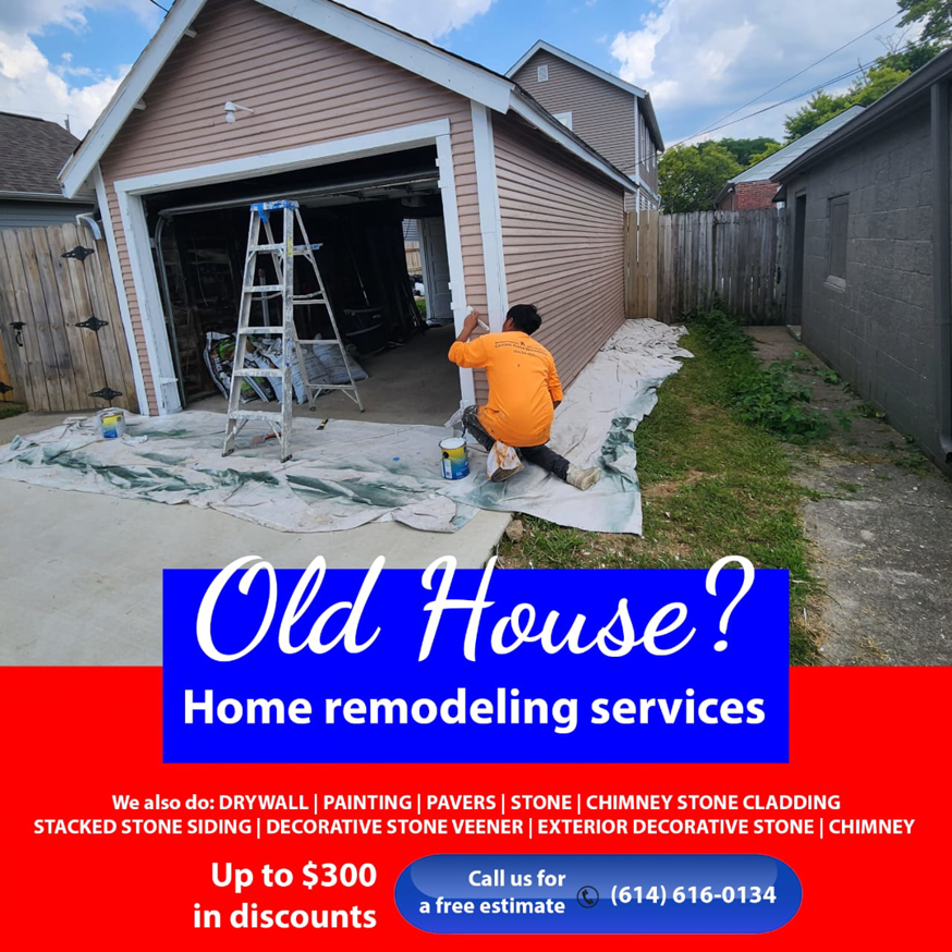 A professional painting the exterior of a house for Cerrato Home Remodeling in Columbus, OH.