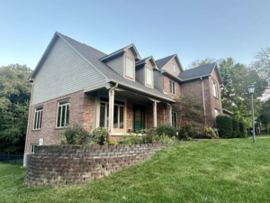 Beautiful exterior house painting and siding work by KP Painting in Captain Cook, HI.