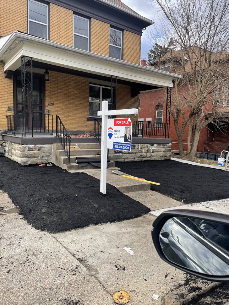 Exterior landscaping with fresh mulch installation by Mudd Brothers Contracting Co. in Pittsburgh, PA.