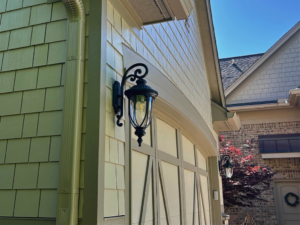 Exterior light fixture installation on a garage by Adam Zengel - Builder in Dayton, OH.