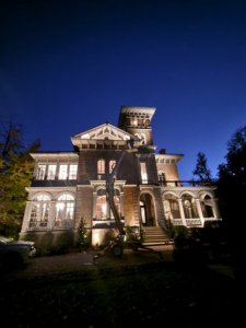 A boom lift used for exterior lighting installation on a large house by Jesse Reed Construction, LLC in Memphis, TN.