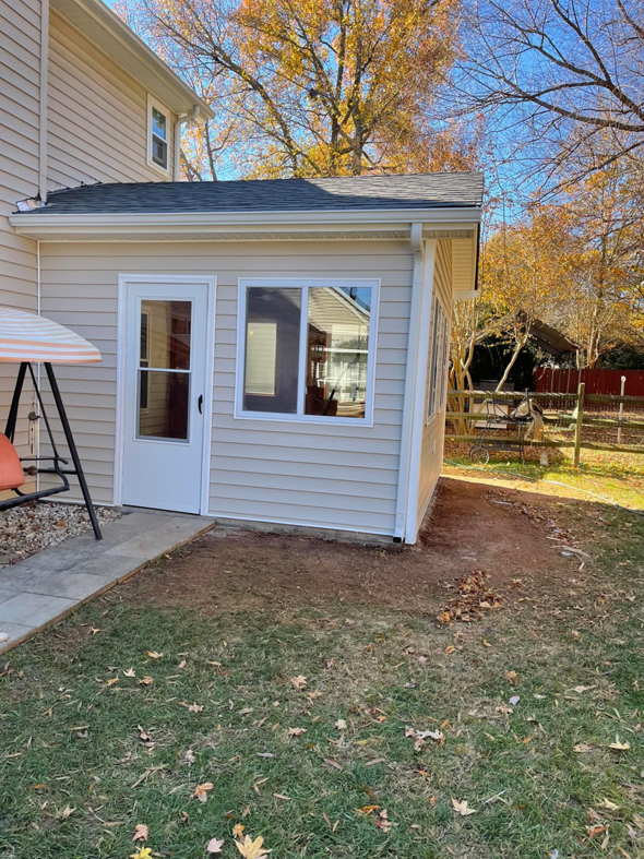 The exterior of a newly completed room addition or sunroom by A.G Deck & Painting in Charlotte, NC.
