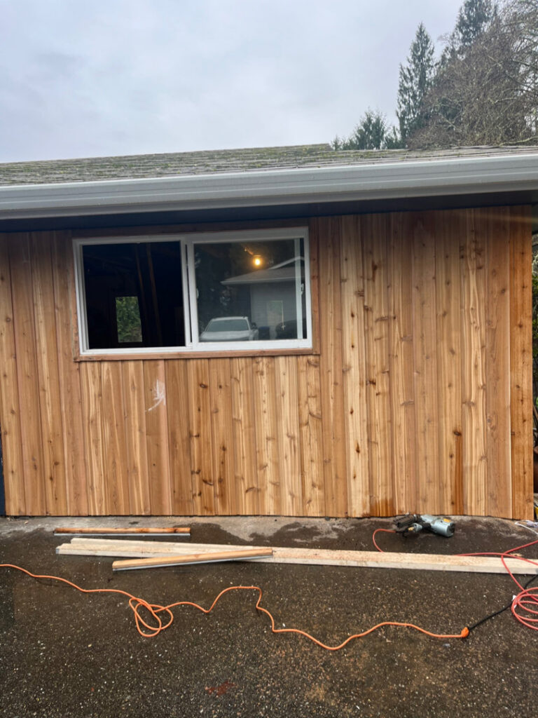 Exterior house siding installation around a window by Prime Construction ent. in Bloomingburg, NY