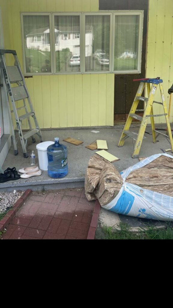 Exterior siding repair and installation in progress on a house by JAC Home Improvement LLC in Danbury, CT.