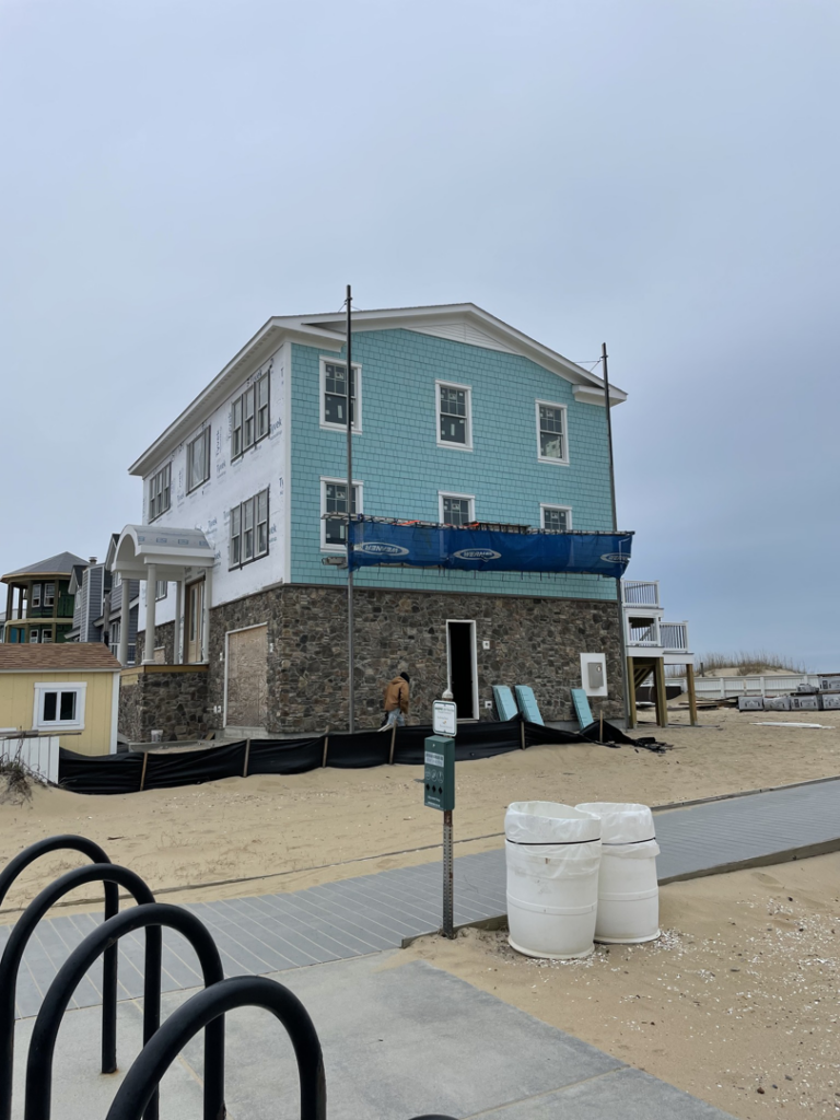 Exterior siding and stone veneer installation in progress by North Landing Exteriors Inc. in Virginia Beach, VA.