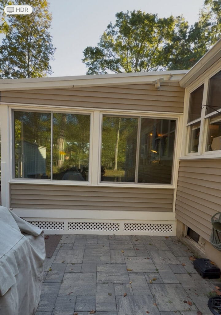 Exterior home renovation showing new siding and windows installed by Byrd's Contracting, LLC in Bristol, CT.