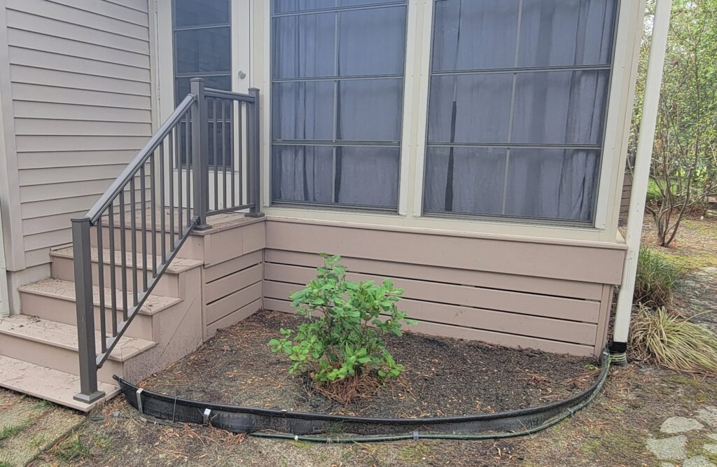 Exterior steps with a new railing installation by M. Phippin Contracting in Hebron, MD.