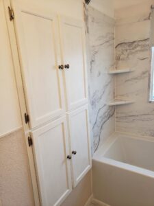 A newly installed exterior storm door on a home, a service provided by ROTH WORX LLC in Bismarck, ND.