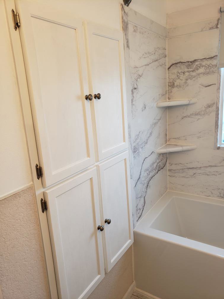 A newly installed exterior storm door on a home, a service provided by ROTH WORX LLC in Bismarck, ND.