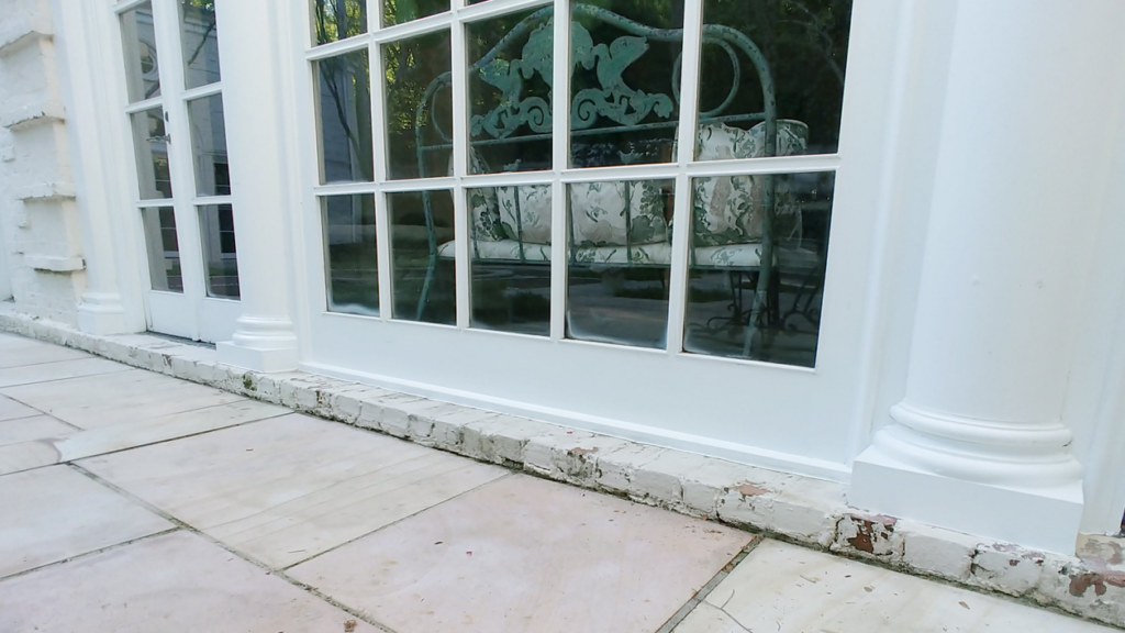 Exterior white trim painting and repair work completed by Just Ducky Painting and Drywall Repair in Pegram, TN.