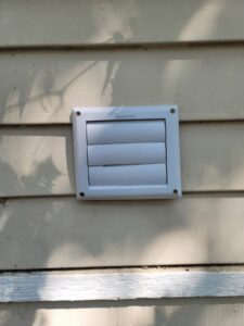 A newly installed exterior vent cover on a house by Friendly Handyman LLC in Wichita, KS