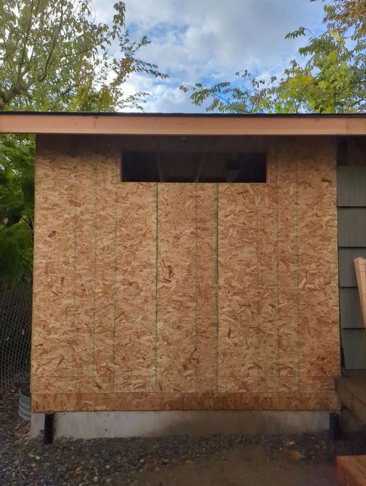 Exterior wall sheathing installation in progress by Becker Custom Construction - pdx in Oak Grove, OR.