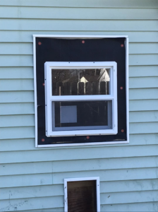 Exterior window installation with an additional opening below by Choice Contractors LLC in Fort Wayne, IN.