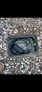 Fiber optic equipment neatly installed within a ground box, demonstrating outdoor infrastructure work by KPL Fiber Solutions LLC in Houston, TX.
