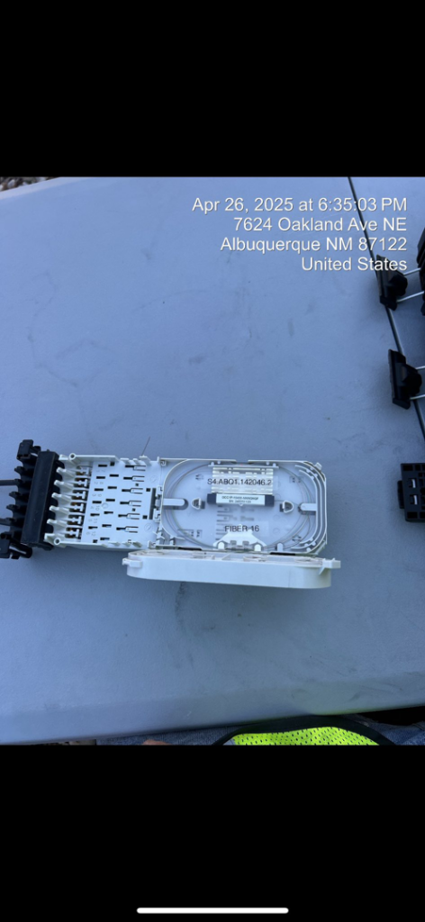 Internal components of a fiber optic splice enclosure, showing detailed work by KPL Fiber Solutions LLC in Houston, TX.