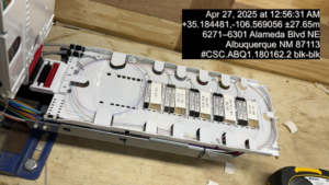 A detailed view of a fiber optic splicing tray with neatly organized cables and modules by KPL Fiber Solutions LLC in Houston, TX.