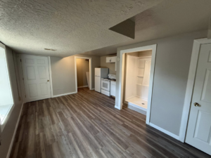 A newly finished basement apartment renovation completed by A&B Snow, Mow, and Contracting in Sioux City, IA.