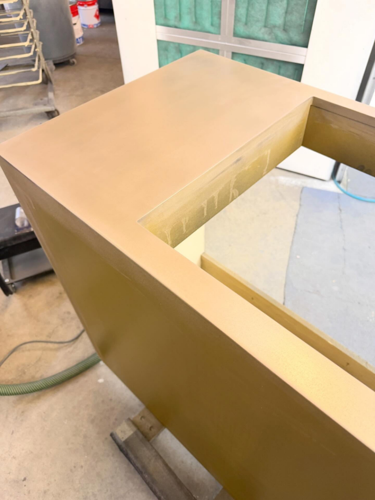 Top view of a newly finished cabinet surface by Bespoke Finish, a handyman service in Minneapolis, MN.