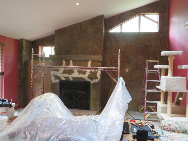A finished closet with newly painted walls and a light fixture by Borrelli Plastering & Sons in O'Fallon, MO.