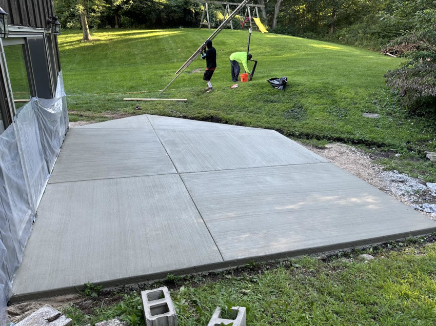 A newly finished concrete patio with control joints installed by R&A Concrete Home Solutions LLC in Appleton, WI.