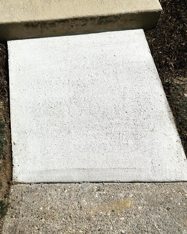 A newly installed and finished concrete step by DG Maintenance Services LLC in Wilmington, DE