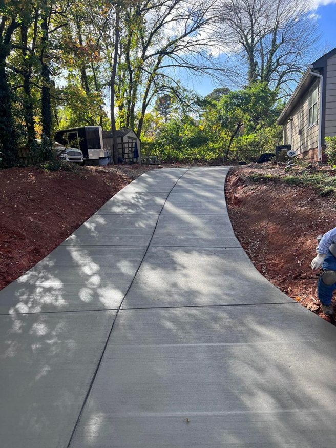 A finished curved concrete driveway installed by Allen's Concrete Finishing in Rock Hill, SC.
