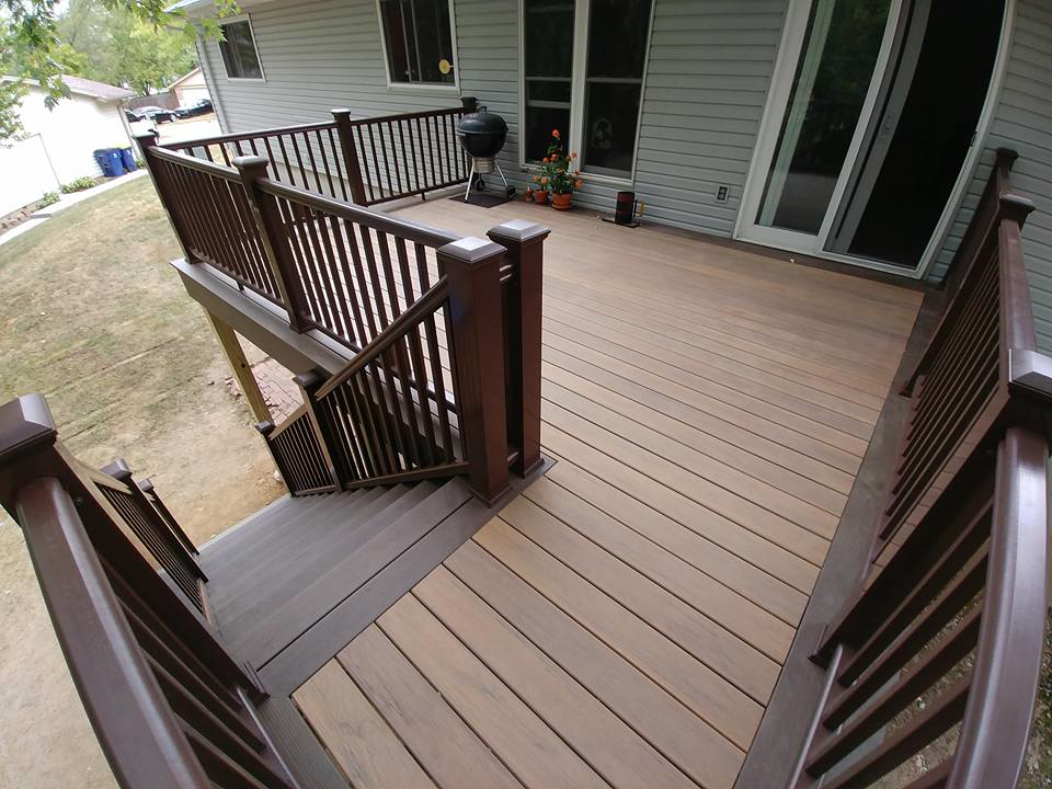An aerial view of a beautifully finished outdoor deck and stairs, completed by Custom Remodeling Inc. in Houston, TX.
