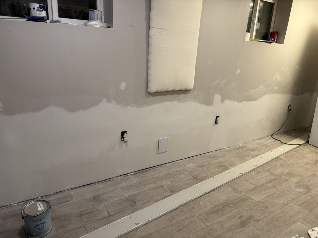 A newly finished drywall wall, mudded and sanded, ready for paint by SurePlan Handyman in North Ogden, UT