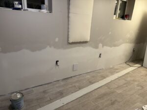 A newly finished drywall wall, mudded and sanded, ready for paint by SurePlan Handyman in North Ogden, UT