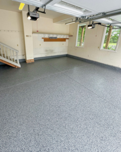 A beautifully finished epoxy garage floor installed by Apex Custom Coatings in Middleton, WI