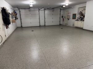 A newly finished epoxy garage floor by Premier Edge Concrete in Grand Rapids, MI