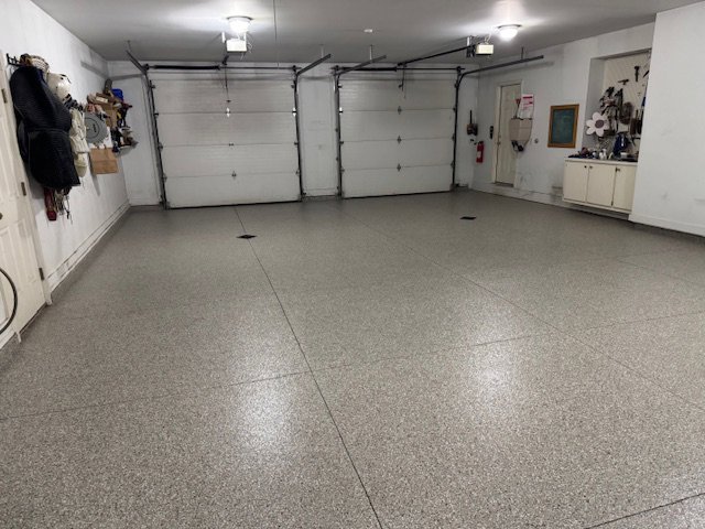 A newly finished epoxy garage floor by Premier Edge Concrete in Grand Rapids, MI